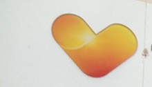 Thomas Cook logo : yellow and orange heart
