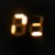 Blurred digital clock numbers